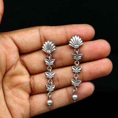 Sterling silver handmade floral drop dangle earrings by TRIBAL ORNAMENTS, lightweight and fancy jewelry for brides and girls.