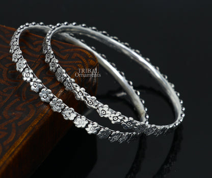925 sterling silver floral design bangle bracelet by TRIBAL ORNAMENTS, showcasing intricate handmade craftsmanship for elegant jewelry.