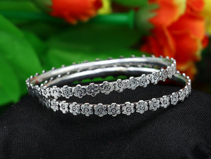 925 sterling silver floral bangle bracelet by TRIBAL ORNAMENTS featuring intricate handmade floral design for stylish jewelry and gifts.