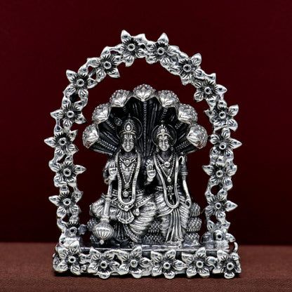 Sterling silver Indian idol figurine of Laxmi and Vishnu with snake, decorative puja gift, handcrafted floral design by TRIBAL ORNAMENTS