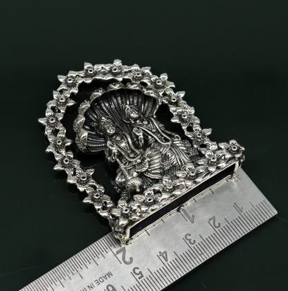 Sterling silver Indian idol figurine of Laxmi and Vishnu with snake design, decorative puja gift, handcrafted floral art by TRIBAL ORNAMENTS.