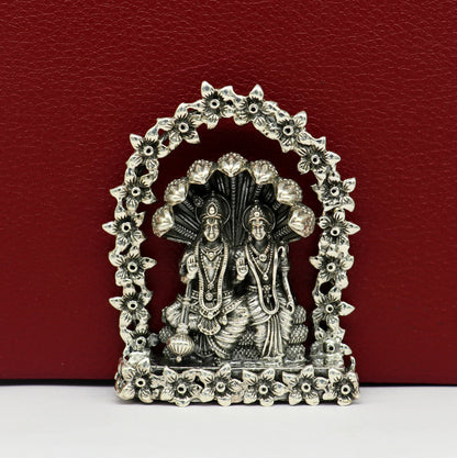 Sterling silver Indian idols of Laxmi and Vishnu with snake statue, handcrafted floral design puja figurines, decorative gift art.