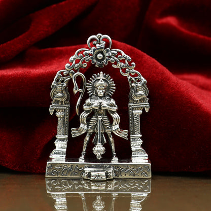 Sterling silver Lord Hanuman figurine with floral design, handmade Indian idol statue, ideal for puja and decorative gifting.