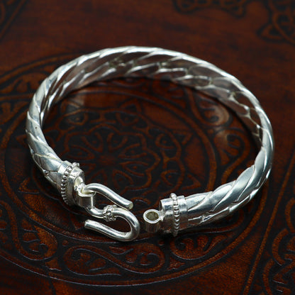 Bright shining 925 sterling silver bangle bracelet by TRIBAL ORNAMENTS, unisex jewelry, handmade, perfect for personalized gifts.