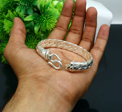 Sterling silver bangle bracelet by Tribal Ornaments, shiny handmade kada jewelry, unisex and perfect for personalized gifts.