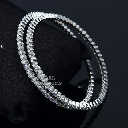 925 sterling silver handmade Cubic Zircon bangle bracelet by Tribal Ornaments, featuring intricate design and sparkling stones.