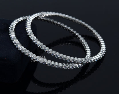 Sterling silver handmade bangle bracelet with cubic zirconia from Tribal Ornaments, featuring intricate design for women and girls.