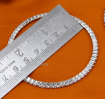 Sterling silver handmade Cubic Zircon bangle bracelet by TRIBAL ORNAMENTS, featuring intricate design for women and girls.