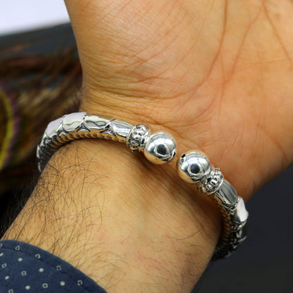 Sterling silver customized work bangle bracelet with vintage design, unisex jewelry by TRIBAL ORNAMENTS featuring intricate handmade details.