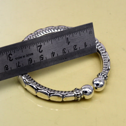 Vintage 925 sterling silver customized work bangle bracelet with intricate tribal design, unisex jewelry by Tribal Ornaments.