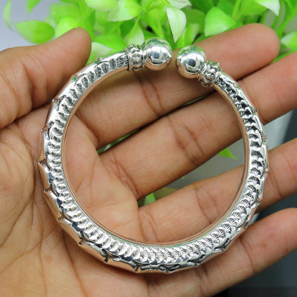Vintage 925 sterling silver customized work bangle bracelet by TRIBAL ORNAMENTS, unisex jewelry with antique design details.
