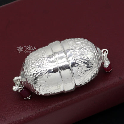 Handmade 925 sterling silver coconut for puja and worship, featuring intricate tribal design for Diwali religious ceremonies.