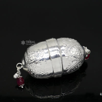Handmade 925 sterling silver coconut for puja and Diwali worship, featuring a detailed, decorative design by TRIBAL ORNAMENTS.