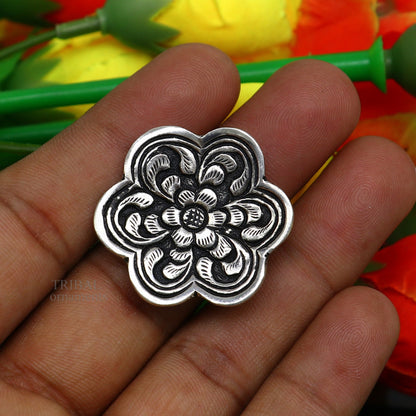 Sterling silver handmade flower-shaped adjustable ring by TRIBAL ORNAMENTS, unisex tribal ethnic jewelry with intricate chitai work design.