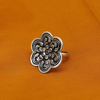 Sterling silver handmade flower-shaped adjustable ring from TRIBAL ORNAMENTS with tribal ethnic design, unisex style jewelry.