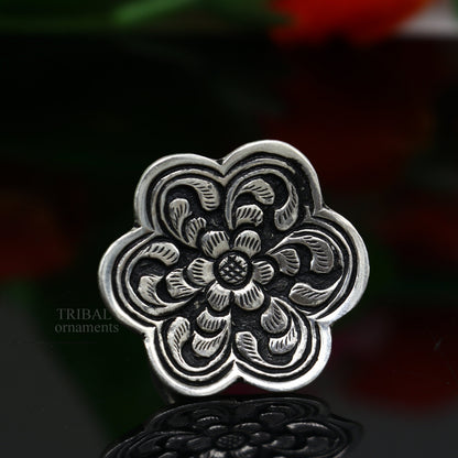 Sterling silver handmade flower-shaped adjustable ring by TRIBAL ORNAMENTS, featuring tribal ethnic design for unisex stylish jewelry.