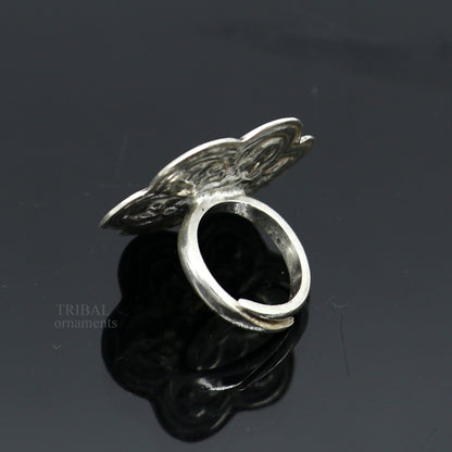 Sterling silver handmade flower-shaped adjustable ring by TRIBAL ORNAMENTS, featuring tribal ethnic jewelry design and unisex style.