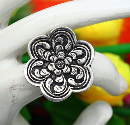 Sterling silver handmade flower-shaped adjustable ring by TRIBAL ORNAMENTS, featuring tribal ethnic jewelry design for unisex style.