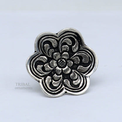 Sterling silver handmade flower-shaped adjustable unisex ring by TRIBAL ORNAMENTS, featuring tribal chitai work and ethnic jewelry style.