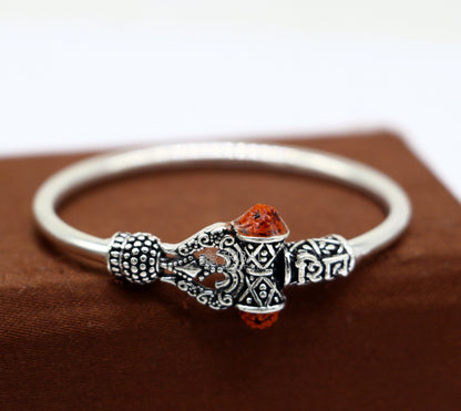 Sterling silver Lord Shiva trident baby bangle bracelet, handmade unisex tribal jewelry with intricate design.