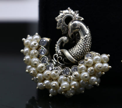 Sterling silver handmade peacock design stud earring with cut stone and pearl, tribal jewelry by TRIBAL ORNAMENTS.