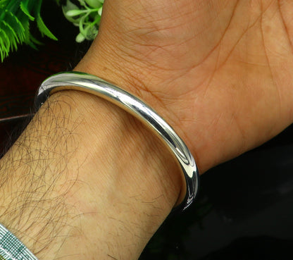 Sterling silver Rudraksha bead open face bangle cuff bracelet by TRIBAL ORNAMENTS, featuring bright, handmade traditional jewelry design.