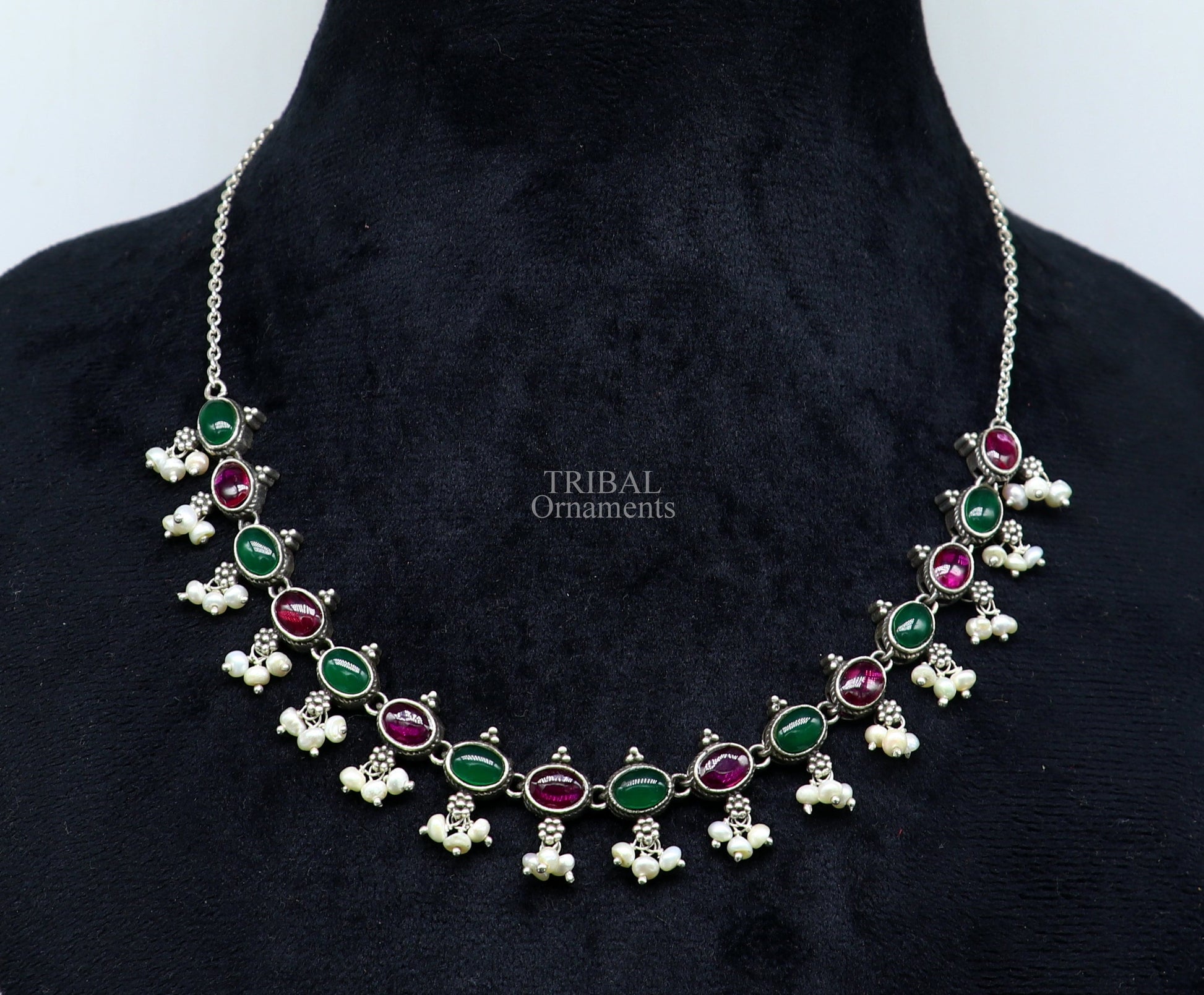 925 sterling silver necklace with red and green stones, pearls, and intricate tribal design, perfect for wedding or bridal jewelry.
