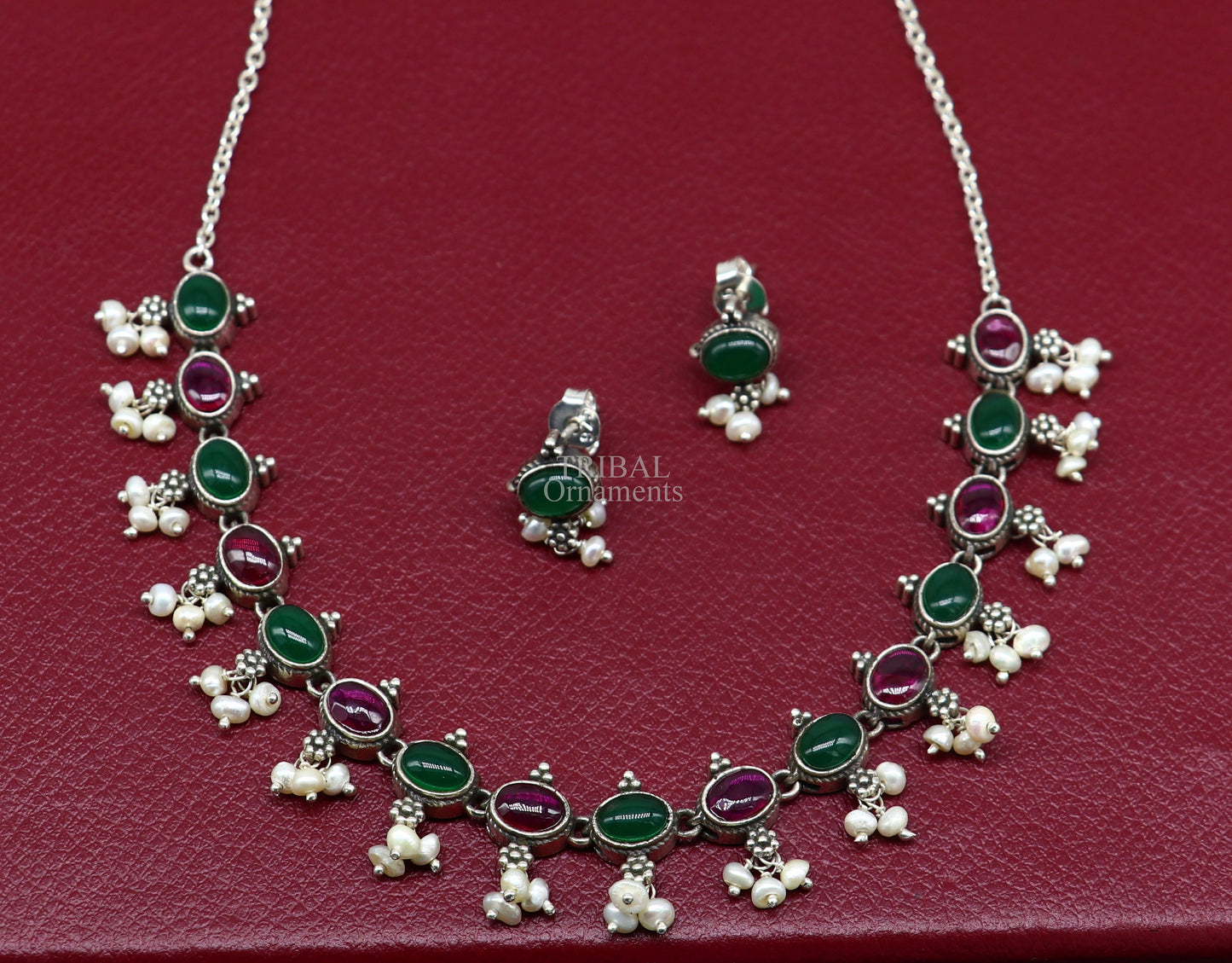 Sterling silver necklace with red and green stones, pearls, and intricate design, perfect for weddings and brides from Tribal Ornaments.