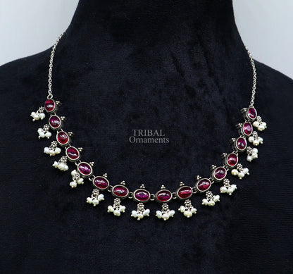 Sterling silver vintage necklace with red stone and pearl accents, featuring a wedding bride's charm, handmade by Tribal Ornaments.