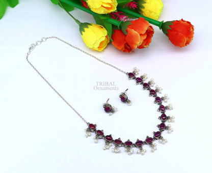 Sterling silver vintage necklace with red stone and pearls, featuring a bride charm, handcrafted by Tribal Ornaments.