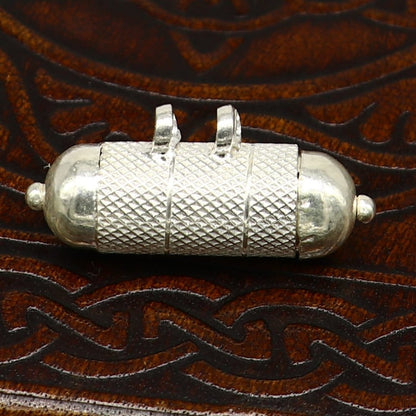 Sterling silver round amulet box pendant with tribal design, handmade tribal jewelry, featuring mantra and tabiz motifs.