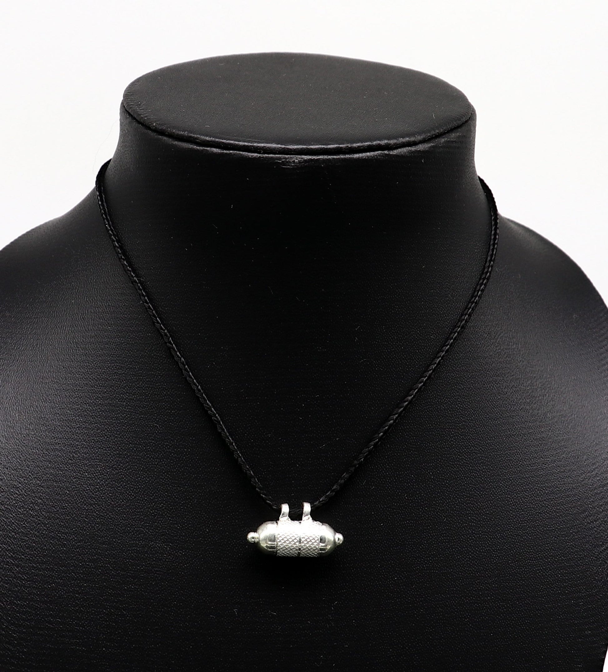 925 sterling silver round amulet box pendant with intricate tribal design, handmade mantra box jewelry by Tribal Ornaments.
