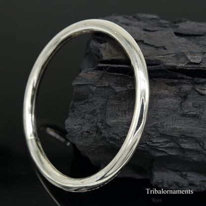 Sterling silver adjustable bangle bracelet by Tribal Ornaments featuring shiny, handmade design for girls' personalized jewelry.