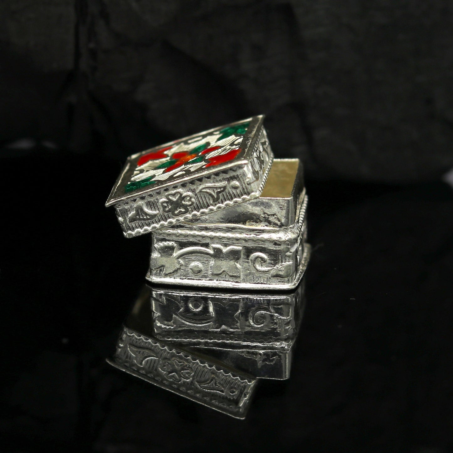 Handmade 925 sterling silver small trinket box with floral enamel design, crafted by TRIBAL ORNAMENTS for compact storage or gifting.
