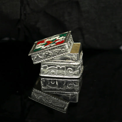 Handmade 925 sterling silver small trinket box with floral enamel design, crafted by TRIBAL ORNAMENTS for compact storage or gifting.