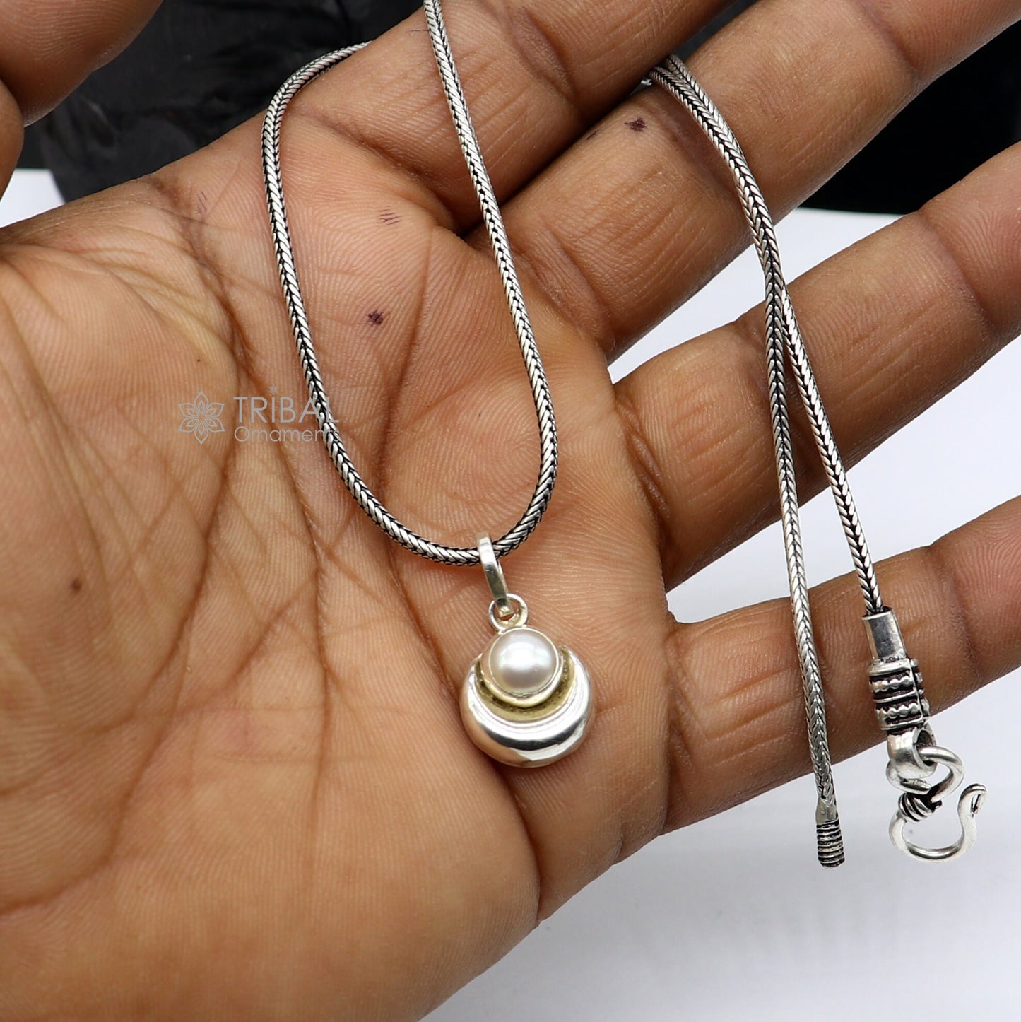 Sterling silver half moon pendant with natural pearl by TRIBAL ORNAMENTS, unisex jewelry with intricate handmade design.