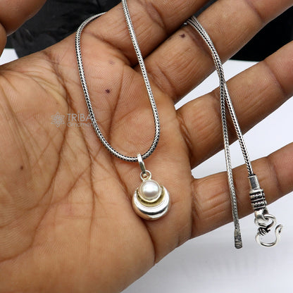 Sterling silver half moon pendant with natural pearl by TRIBAL ORNAMENTS, unisex jewelry with intricate handmade design.