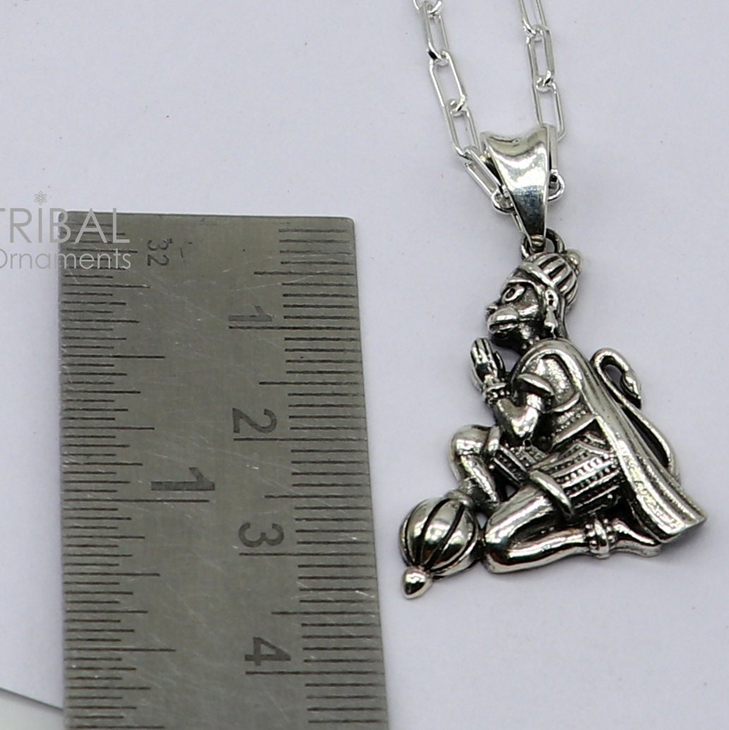 925 sterling silver Lord Hanuman pendant featuring divine Bajarangbali design, unisex handmade Hindu jewelry by Tribal Ornaments.