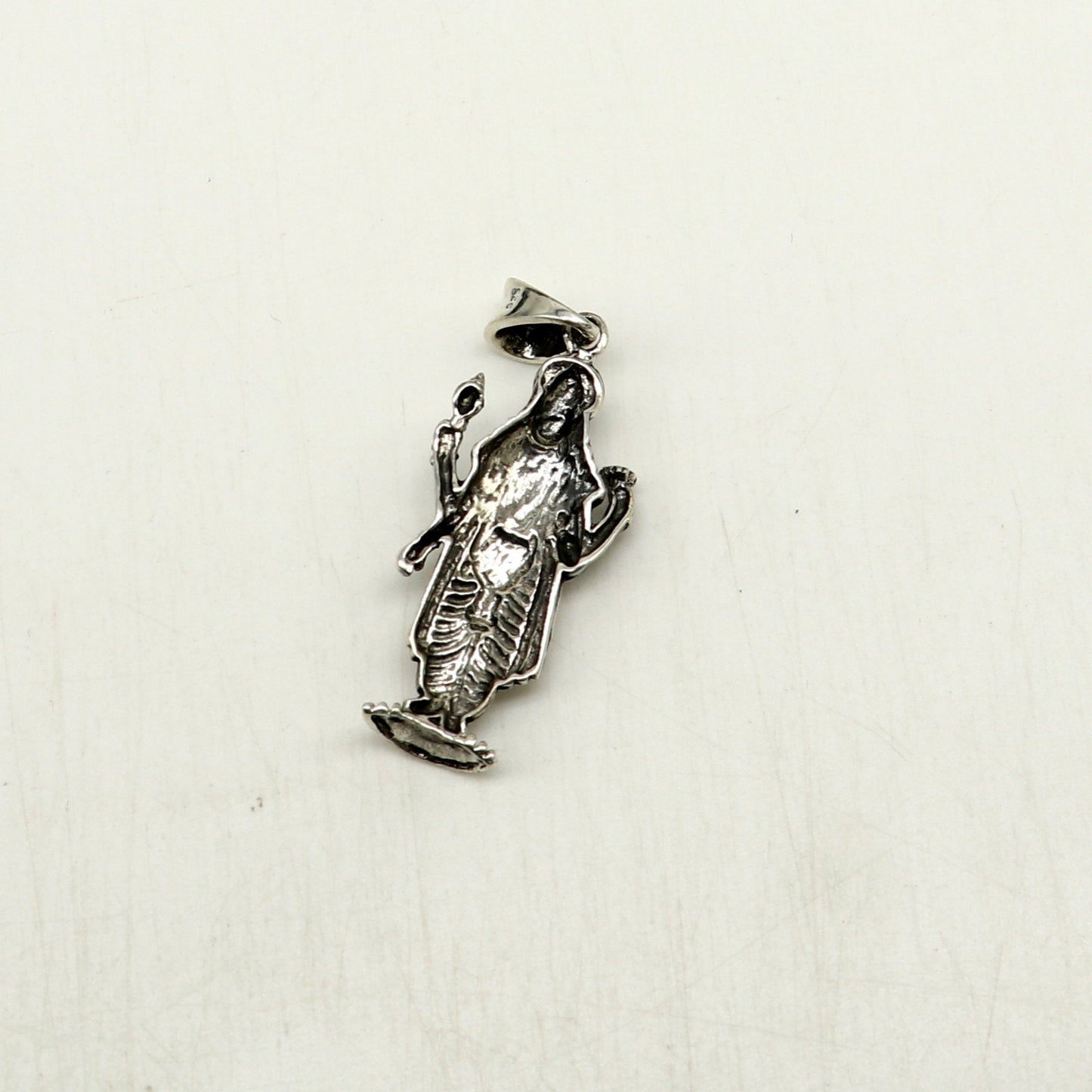 Unisex 925 sterling silver Vishnu pendant featuring intricate Hindu deity design, handmade tribal jewelry from India.