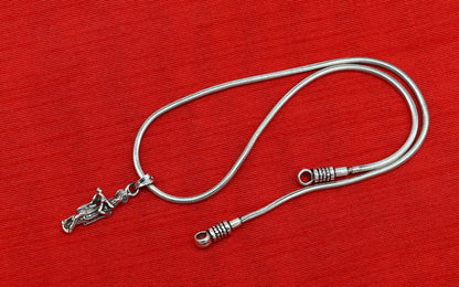 Sterling silver Krishna pendant featuring a detailed Hindu idol, handmade unisex jewelry with personalized tribal design.