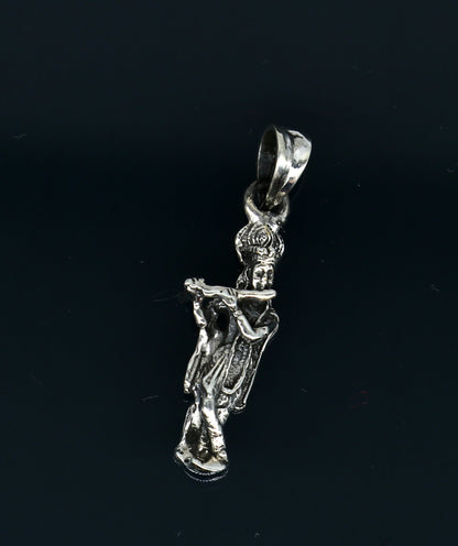 Sterling silver Krishna pendant featuring a detailed Hindu idol design, unisex handmade jewelry by Tribal Ornaments.