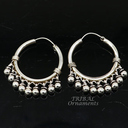 925 sterling silver handmade hoop earring with hanging bells, hook design, elegant tribal style from TRIBAL ORNAMENTS.
