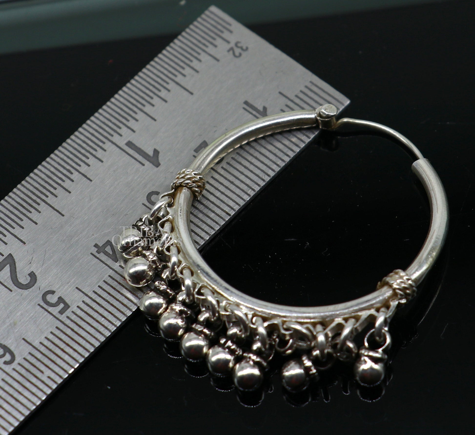 925 sterling silver handmade hoop earring with Bali hanging bells and hook, featuring tribal-inspired design and custom jewelry details.