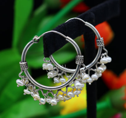 925 sterling silver handmade hoop earring with hanging pearls, tribal design from Bali, featuring hook closure and custom jewelry style