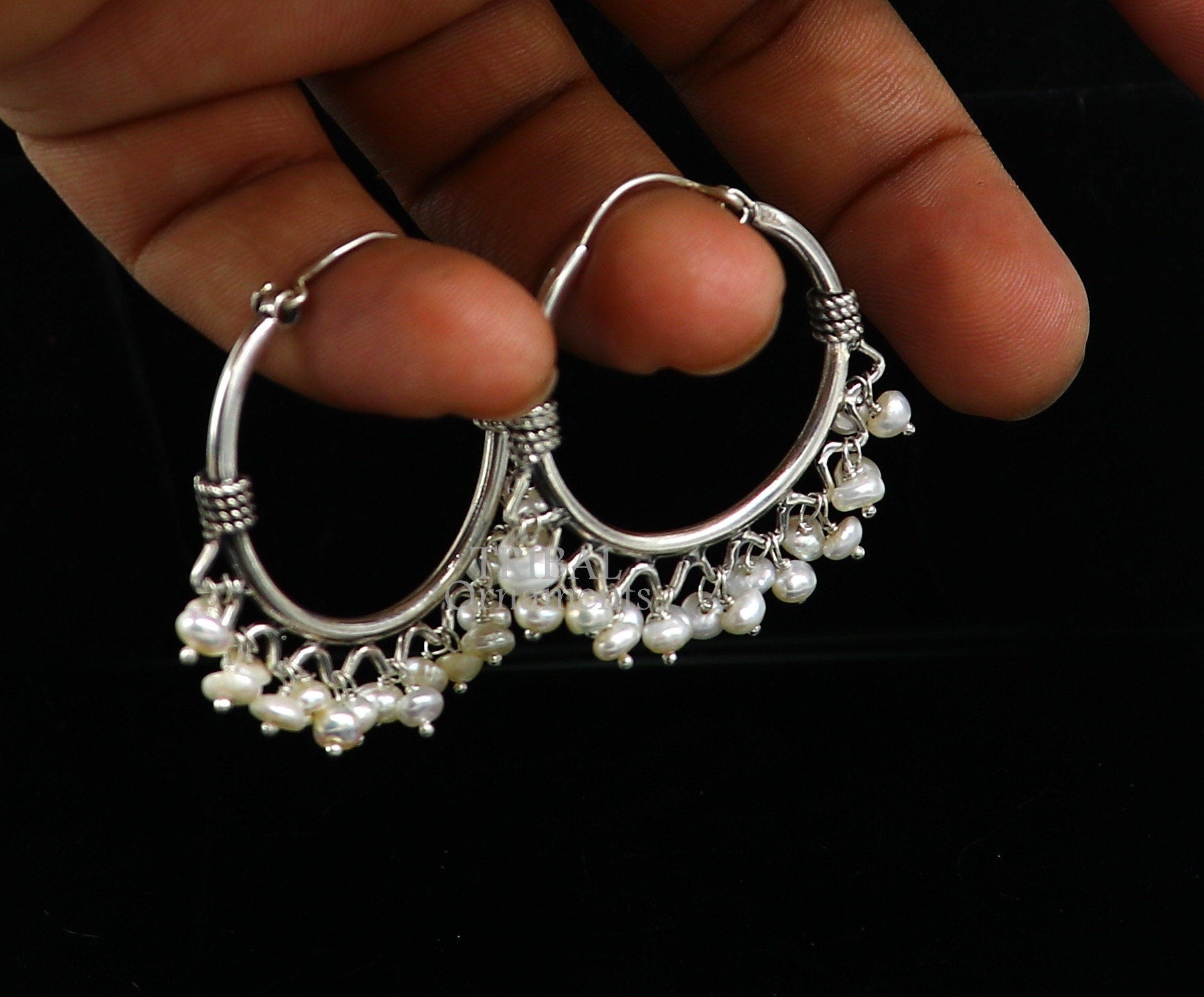 925 sterling silver handmade hoop earring with hanging pearls from Bali, tribal design, hook closure, elegant jewelry piece.
