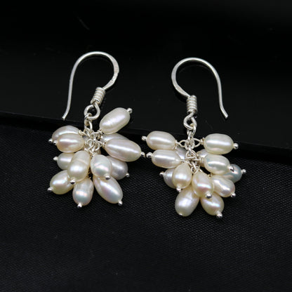 Sterling silver handmade hoops earrings with tiny freshwater pearls, perfect for bridesmaids, by TRIBAL ORNAMENTS.