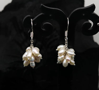 Sterling silver handmade hoop earrings with tiny freshwater pearls, perfect for bridesmaids from Tribal Ornaments.