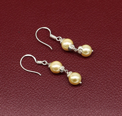 925 sterling silver handmade hoop earrings with dangling pearls, perfect for bridesmaids and special occasions, by TRIBAL ORNAMENTS.