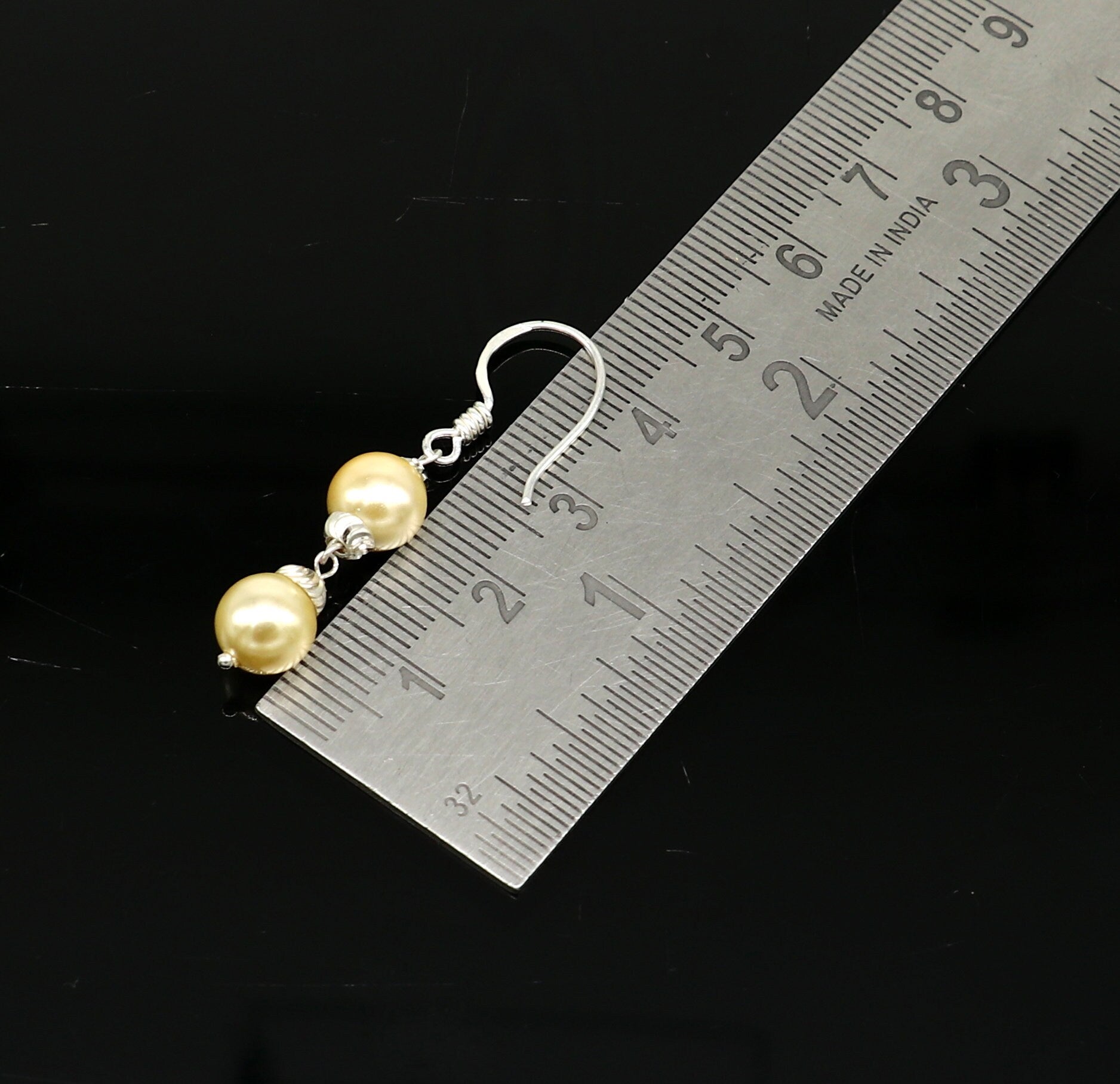 Handmade 925 sterling silver hoop earrings with dangling pearls, perfect for bridesmaids or special occasions, by Tribal Ornaments.