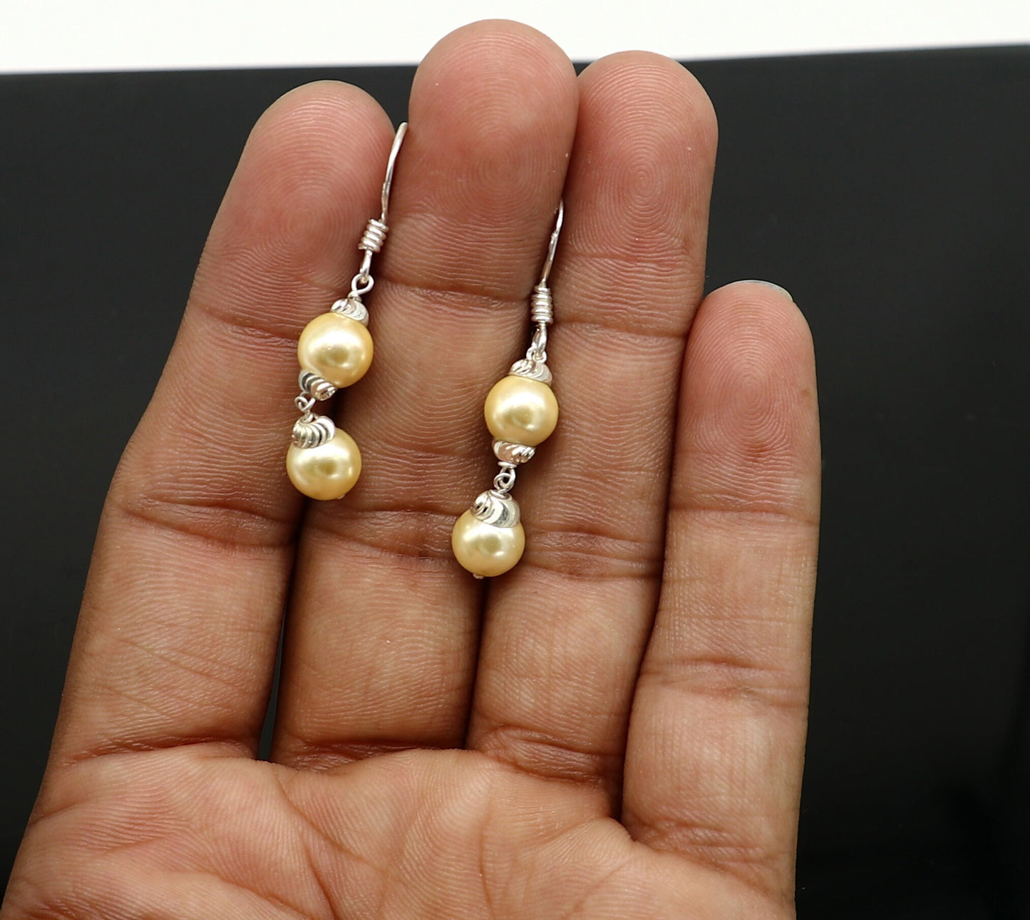 Sterling silver handmade hoop earrings with dangling pearls, perfect for bridesmaids or special occasions, by TRIBAL ORNAMENTS.